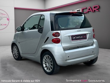 Smart fortwo 1.0 71 ch passion - suivi complet/toit panoramique/caribex cuir blanc/clim/gps - garantie 12 mois occasion...