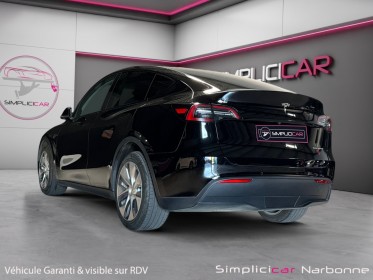 Tesla model y grande autonomie dual motor awd carplay sièges chauffants garantie constructeur occasion simplicicar narbonne...
