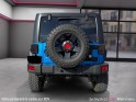 Jeep wrangler 2.8 crd 200cv rubicon jk wrangler 5 portes , carplay, 31650 km , couleur hydro blue, rehaussée , pont...
