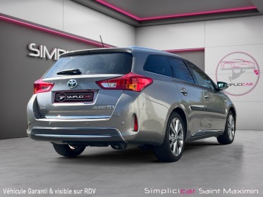 Toyota auris touring sports hybride 136h style  / entretien full toyota occasion simplicicar st-maximin simplicicar...