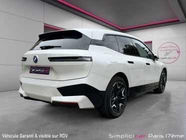 Bmw ix i20 xdrive50 523ch toit panoramique-sieges electriques-roue arriere directrice-suspention hydraulique-garantie 12 mois...