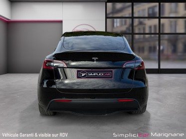 Tesla model y standard rwd sièges chauffant volant chauffant toit panoramique autopilot garantie constructeur 2030 occasion...