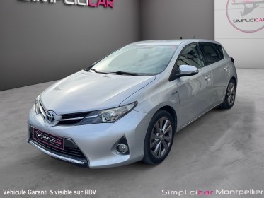 Toyota auris hybride 136h dynamic garantie 12 mois occasion montpellier (34) simplicicar simplicibike france