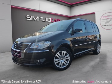 Volkswagen touran confort 2.0 16s tdi 14 dsg6  7pl  clim attelage gps moteur changer distri ok vidange moteur ok  vidange......