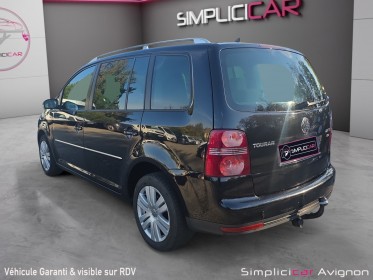 Volkswagen touran confort 2.0 16s tdi 14 dsg6  7pl  clim attelage gps moteur changer distri ok vidange moteur ok  vidange......