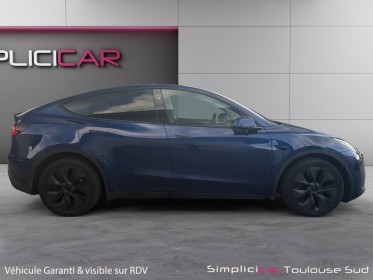 Tesla model y standard rwd caméra de recul sièges électriques et chauffants garantie constructeur 11/2028 occasion...