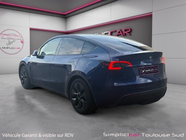 Tesla model y standard rwd caméra de recul sièges électriques et chauffants garantie constructeur 11/2028 occasion...