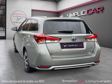Toyota auris touring sports pro my17 hybride pro 136h design business occasion simplicicar livry gargan simplicicar...