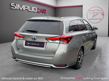 Toyota auris touring sports pro my17 hybride pro 136h design business occasion simplicicar livry gargan simplicicar...