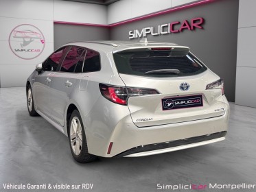 Toyota corolla touring sports hybride pro pro hybride 122h dynamic business garantie 12 mois occasion montpellier (34)...