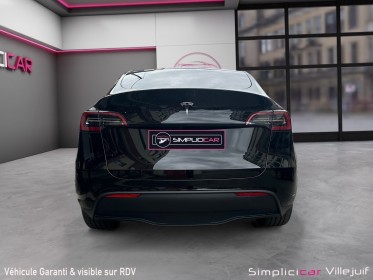 Tesla model y standard rwd, toit pano, caméra de recul, garantie tesla. occasion simplicicar villejuif  simplicicar...