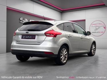 Ford focus 1.0 ecoboost 125 ss titanium garantie 12 mois radars de recul occasion simplicicar villebon-sur-yvette simplicicar...