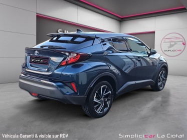 Toyota c-hr hybride my23 simplifiee 1.8l design ultimate / 1ère main / garantie constructeur occasion simplicicar la ciotat...
