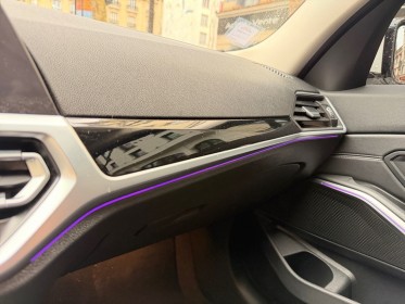 Bmw serie 3 g20 330e 292 ch bva8 edition sport / radar de recul / sieges av chauffants / eclairage d'ambiance occasion paris...