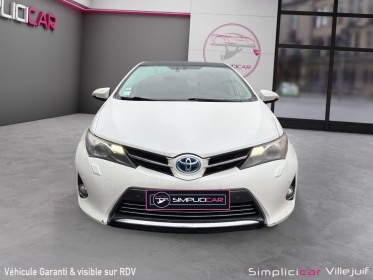 Toyota auris hybride 136h style, caméra ar, radar av/ar, toit panoramique, siège chauffant, garantie 12 mois. occasion...