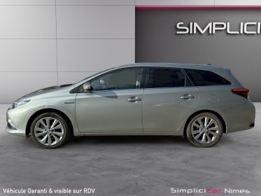 Toyota auris business hybride 136h dynamic business - caméra de recul - sièges chauffants - attelage - garantie 12 mois...