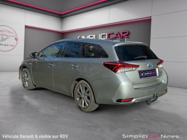 Toyota auris business hybride 136h dynamic business - caméra de recul - sièges chauffants - attelage - garantie 12 mois...