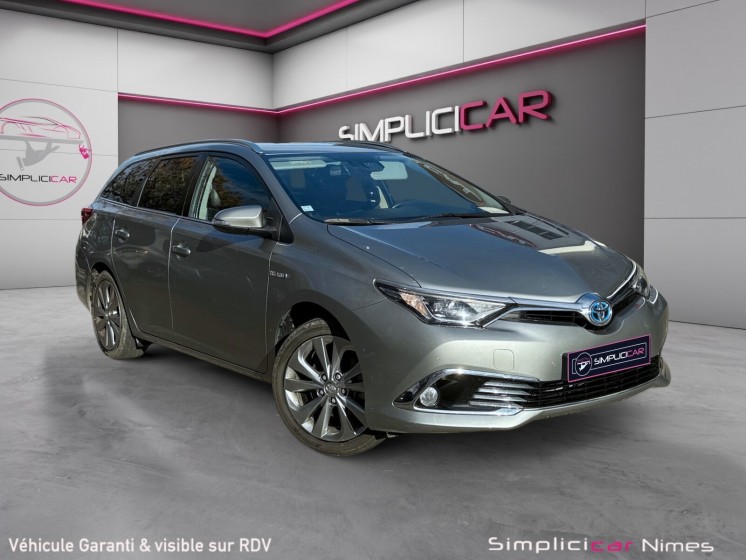 Toyota auris business hybride 136h dynamic business - caméra de recul - sièges chauffants - attelage - garantie 12 mois...