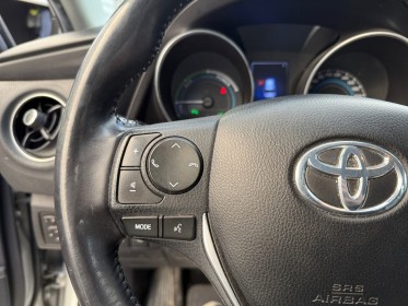 Toyota auris business hybride 136h dynamic business - caméra de recul - sièges chauffants - attelage - garantie 12 mois...