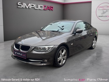 Bmw serie 3 e90 lci 318i 143 ch confort/entretien a jour/garantie 12 mois occasion paris 17ème (75)(porte maillot)...