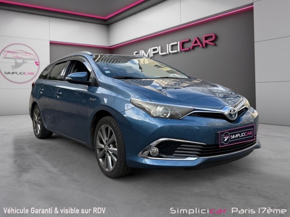Toyota auris touring sports hybride 136h design/entretien a jour/garantie 12 mois occasion paris 17ème (75)(porte maillot)...