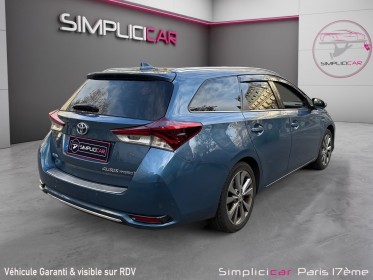 Toyota auris touring sports hybride 136h design/entretien a jour/garantie 12 mois occasion paris 17ème (75)(porte maillot)...