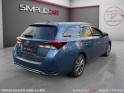 Toyota auris touring sports hybride 136h design/entretien a jour/garantie 12 mois occasion paris 17ème (75)(porte maillot)...