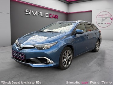 Toyota auris touring sports hybride 136h design/entretien a jour/garantie 12 mois occasion paris 17ème (75)(porte maillot)...