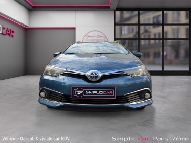 Toyota auris touring sports hybride 136h design/entretien a jour/garantie 12 mois occasion paris 17ème (75)(porte maillot)...