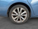 Toyota auris touring sports hybride 136h design/entretien a jour/garantie 12 mois occasion paris 17ème (75)(porte maillot)...