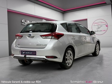 Toyota auris hybride 136h dynamic - garantie 12 mois occasion simplicicar brest simplicicar simplicibike france