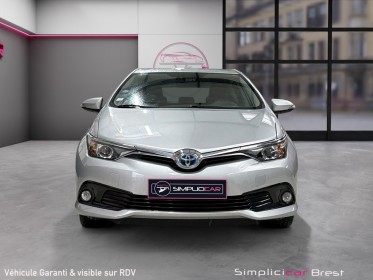 Toyota auris hybride 136h dynamic - garantie 12 mois occasion simplicicar brest simplicicar simplicibike france