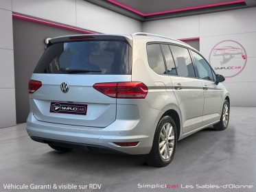 Volkswagen touran business 1.6 tdi 110 bmt confortline 7pl dsg7 garantie 12 mois boite auto monospace compact occasion...