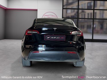 Tesla model y grande autonomie dual motor awd carplay sièges chauffants garantie constructeur occasion simplicicar narbonne...