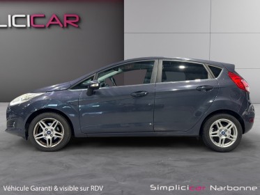 Ford fiesta 1.5 tdci 75 fap titanium radar ar clim garantie 12 mois occasion simplicicar narbonne simplicicar simplicibike...