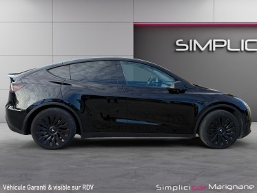 Tesla model y standard rwd sièges chauffant volant chauffant toit panoramique autopilot garantie constructeur 2030 occasion...