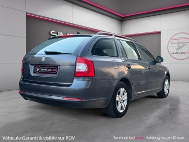Skoda octavia combi 1.6 tdi 105 cr fap ambition ii garantie 12 mois occasion simplicicar mery-sur-oise simplicicar...