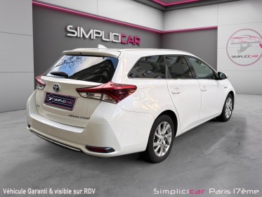 Toyota auris touring sports my17 hybride 136h design/entretien a jour/garantie 12 mois occasion paris 17ème (75)(porte...