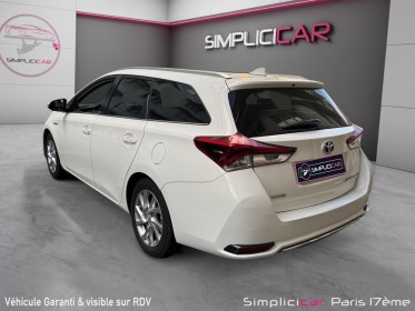 Toyota auris touring sports my17 hybride 136h design/entretien a jour/garantie 12 mois occasion paris 17ème (75)(porte...