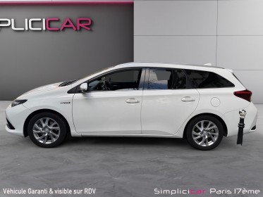 Toyota auris touring sports my17 hybride 136h design/entretien a jour/garantie 12 mois occasion paris 17ème (75)(porte...