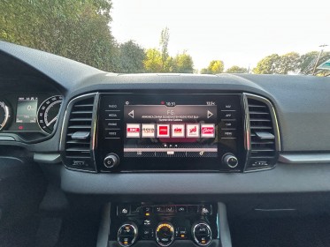 Skoda karoq 1.6 tdi 116 ch dsg7 ambition occasion simplicicar vaucresson simplicicar simplicibike france