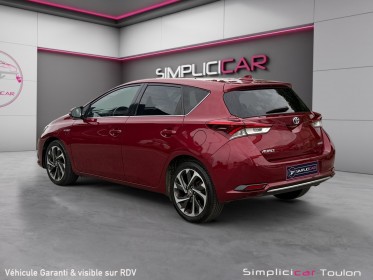 Toyota auris business hybride 136h dynamic business 1er main entretien toyota complet occasion simplicicar toulon est...