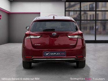 Toyota auris business hybride 136h dynamic business 1er main entretien toyota complet occasion simplicicar toulon est...