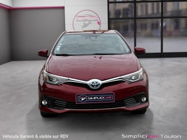 Toyota auris business hybride 136h dynamic business 1er main entretien toyota complet occasion simplicicar toulon est...
