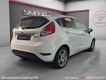 Ford fiesta 1.0 100ch titanium powershift garantie 12 mois occasion montpellier (34) simplicicar simplicibike france