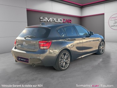 Bmw serie 1 f20 m135i xdrive 320 ch - toit ouvrant - sièges électriques chauffant - ligne m perf - garantie 12 mois...