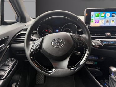 Toyota c-hr hybride my23 simplifiee 1.8l design ultimate / carplay / siège chauffant / garantie 12 mois occasion paris...
