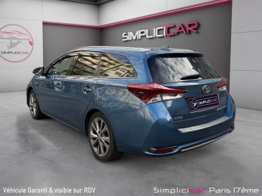 Toyota auris touring sports hybride 136h design/entretien a jour/garantie 12 mois occasion paris 17ème (75)(porte maillot)...