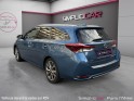 Toyota auris touring sports hybride 136h design/entretien a jour/garantie 12 mois occasion paris 17ème (75)(porte maillot)...