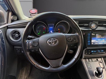 Toyota auris touring sports hybride 136h design/entretien a jour/garantie 12 mois occasion paris 17ème (75)(porte maillot)...